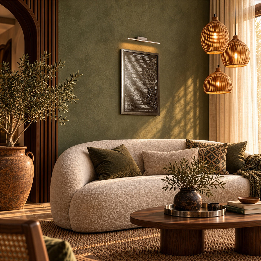Silver framed Farewell Sermon wall art seen at an angle in a living room with rattan pendant lights