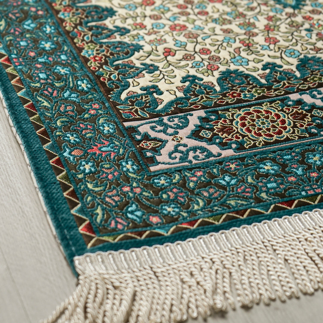 Floral Vine Prayer Rug in Turquoise - Cream: close-up of the corner, border and fringe