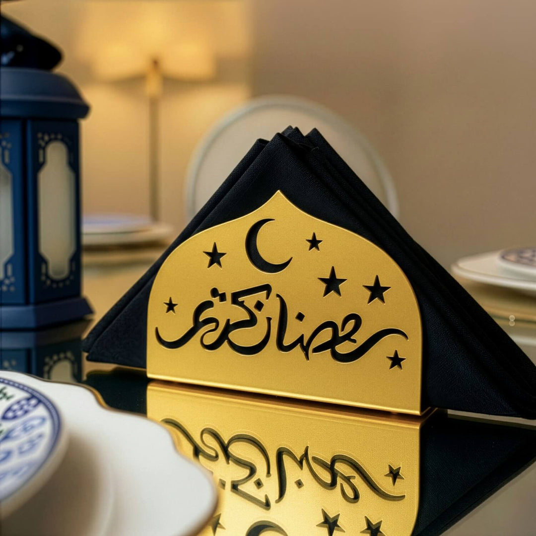 Ramadan Kareem metal napkin holder in gold on a set table