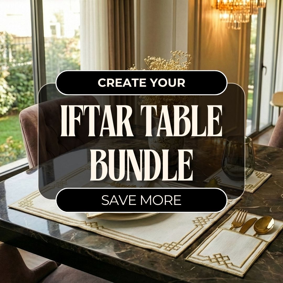 Iftar table bundle banner showing placemats, a cutlery pouch and gold cutlery on a dark marble dining table