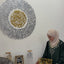 Round Ayatul Kursi wall art in silver and gold with Ramadan table decor, shared by @rim.official__