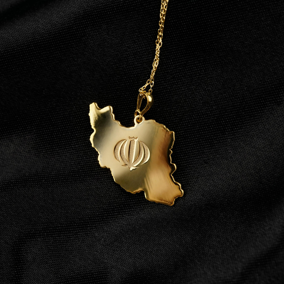 Iran map necklace in gold on black satin