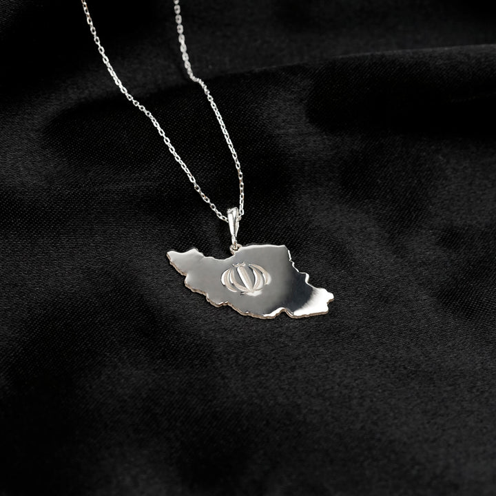 Iran map necklace in silver on black satin