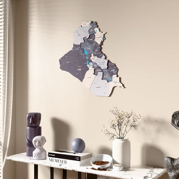 Nimbus Iraq wooden wall map beside a sheer curtain, angled view