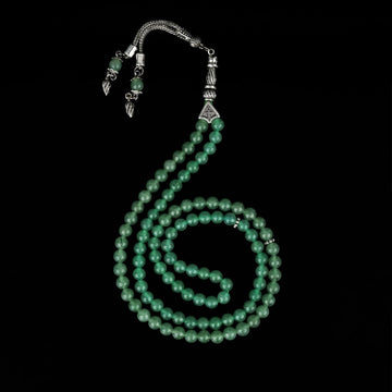 Full length of the aventurine quartz tasbeeh hanging in a loop with the tassel at the top