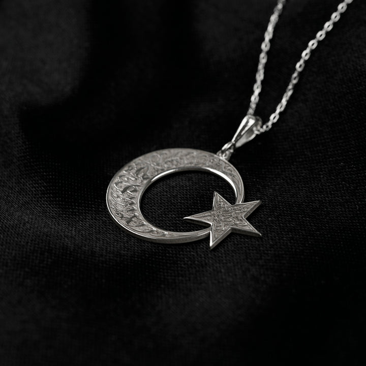 Kalima Tawhid crescent and star necklace in silver on black satin