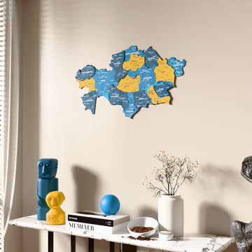 Flag colored Kazakhstan wooden wall map beside a sheer curtain, angled view