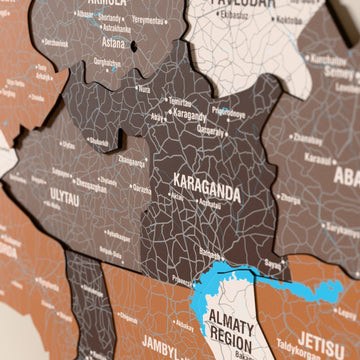 Close-up of the Soil Kazakhstan wooden wall map with layered regions and printed names