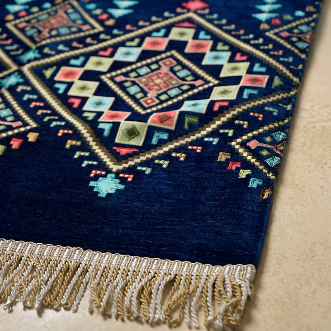 Kilim Prayer Rug in Navy: close-up of the corner, kilim motifs and fringe