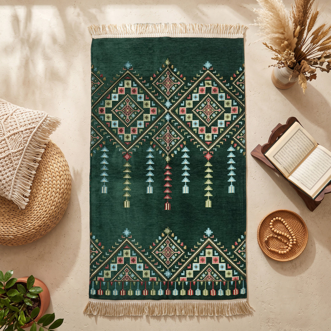 Kilim Prayer Rug in Emerald Green, top view on the floor next to a Quran stand and cushions