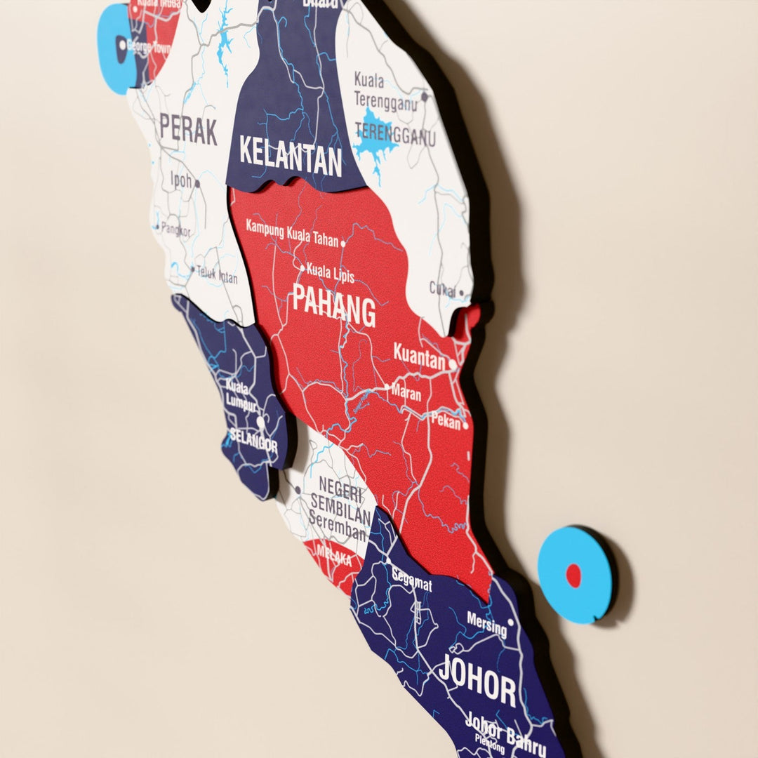 Close-up of the Flag colored Malaysia wooden wall map with layered regions and printed names