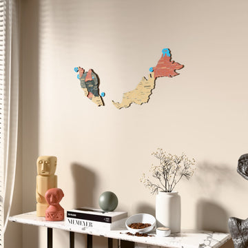 Sage Malaysia wooden wall map beside a sheer curtain, angled view