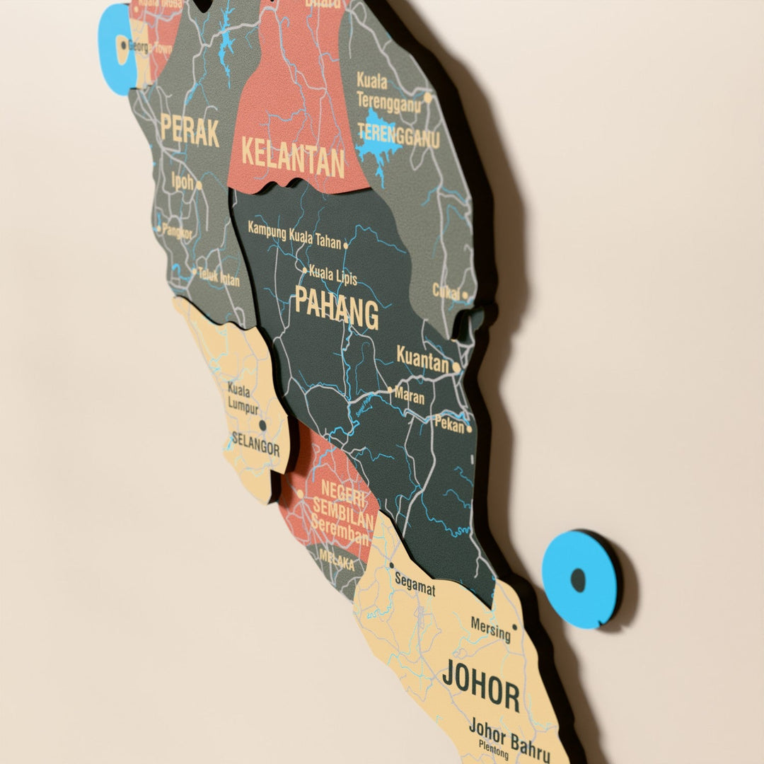 Close-up of the Sage Malaysia wooden wall map with layered regions and printed names
