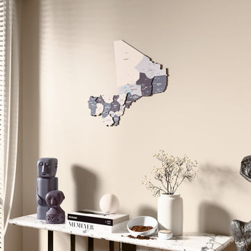 Nimbus Mali wooden wall map beside a sheer curtain, angled view