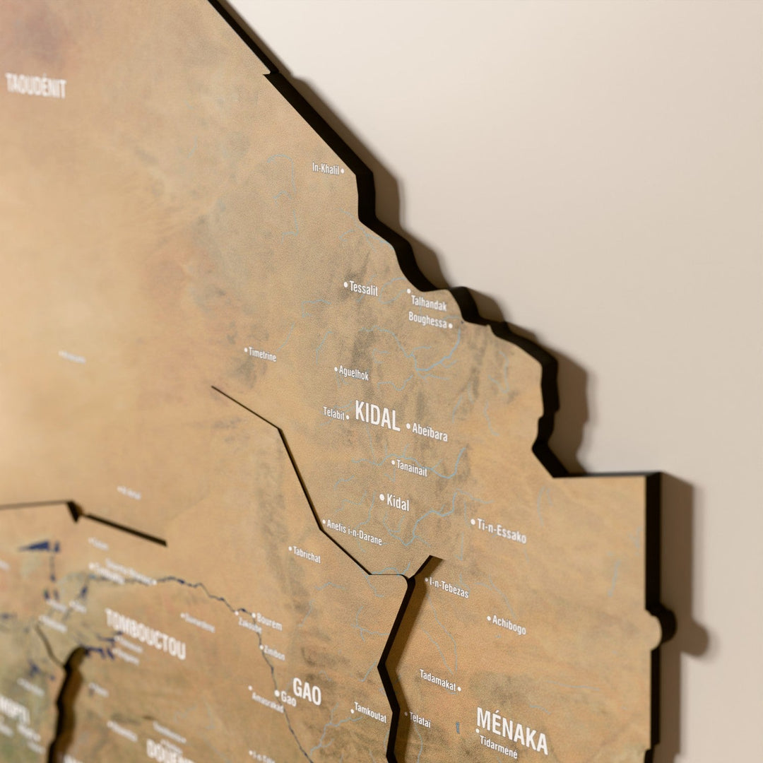Close-up of the Satellite Mali wooden wall map with layered regions and printed names