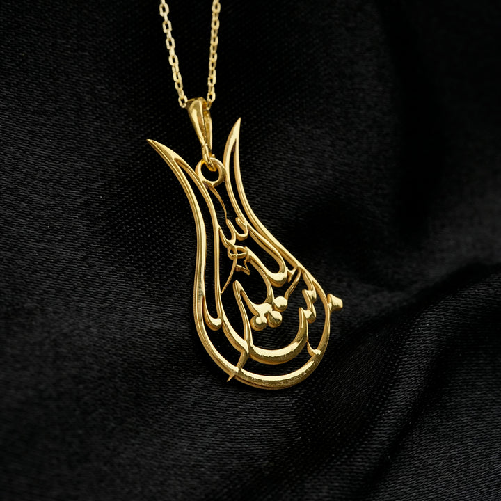 Tulip Mashallah necklace in gold on black satin