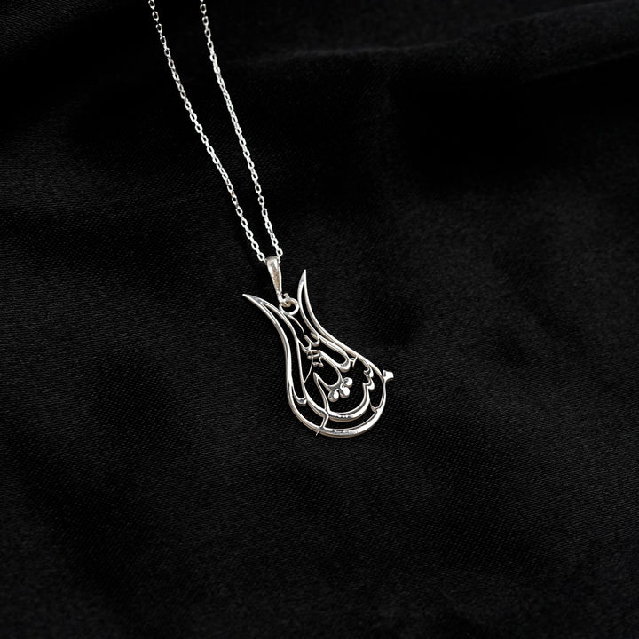 Tulip Mashallah necklace in silver on black satin