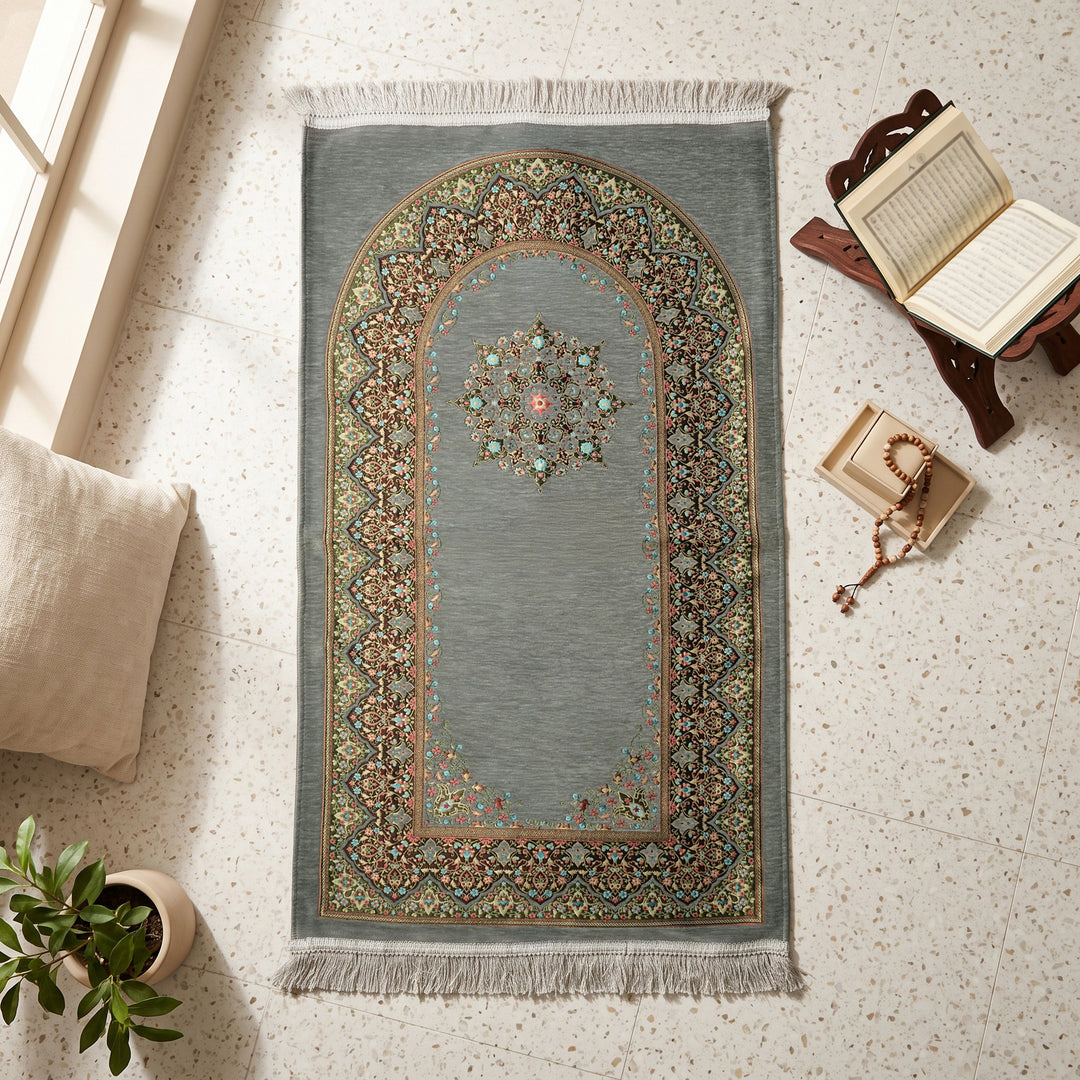 Mihrab Prayer Rug in Gray, top view on the floor next to a Quran stand and cushions
