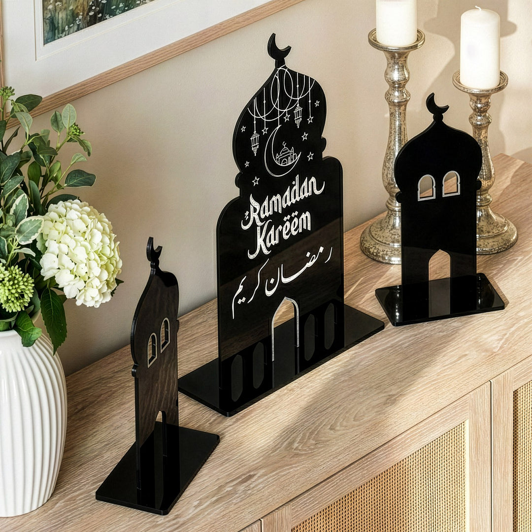 Side angle view of modern Islamic table decor showing the glossy black acrylic finish and sturdy freestanding bases.