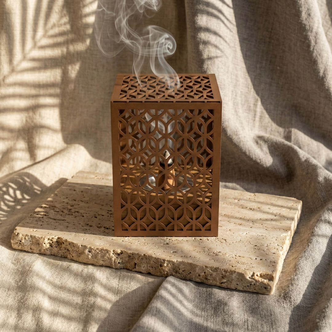 Front view of the copper Petal Lattice wooden base mabkhara showing the petal pattern on the frame