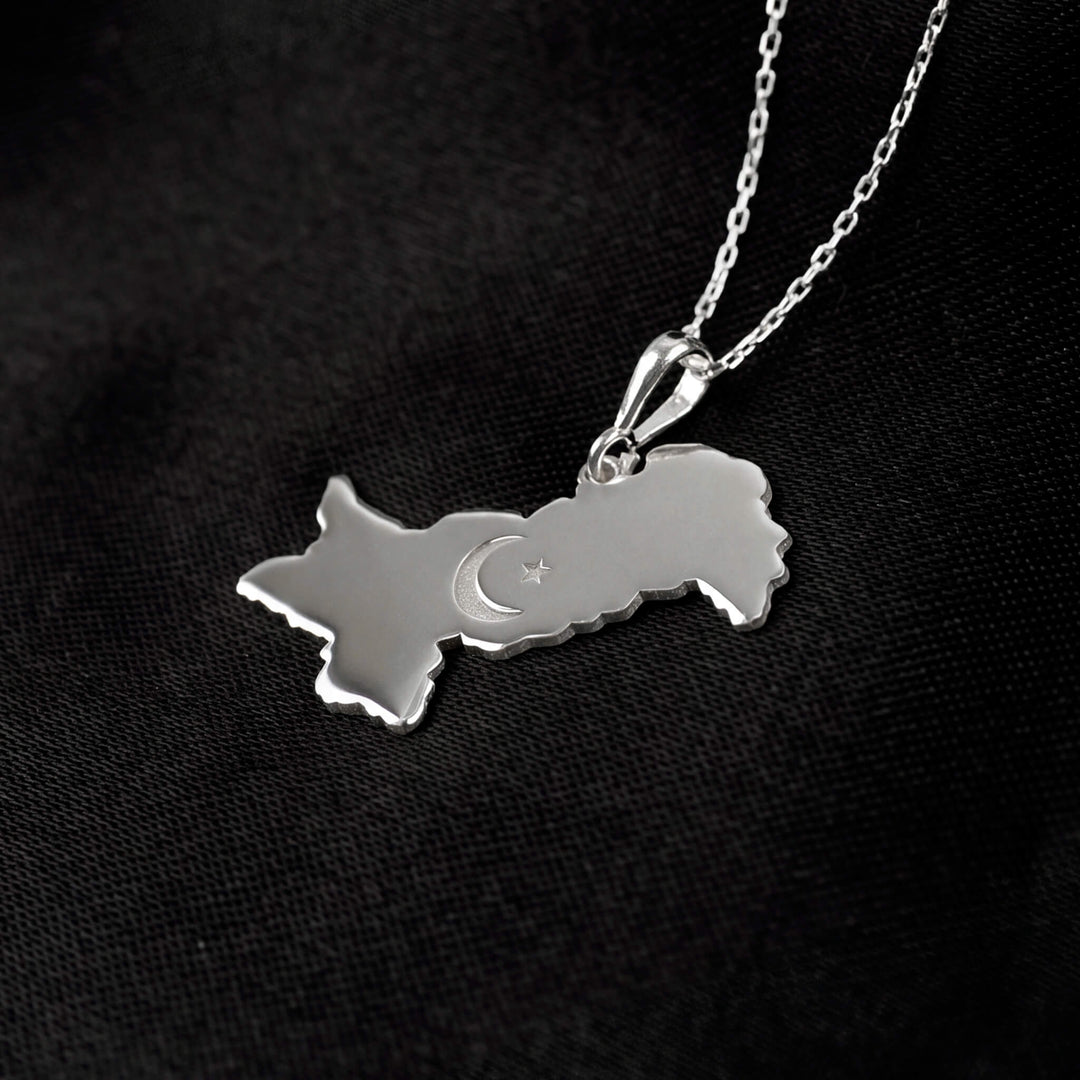 Pakistan map necklace, polished silver