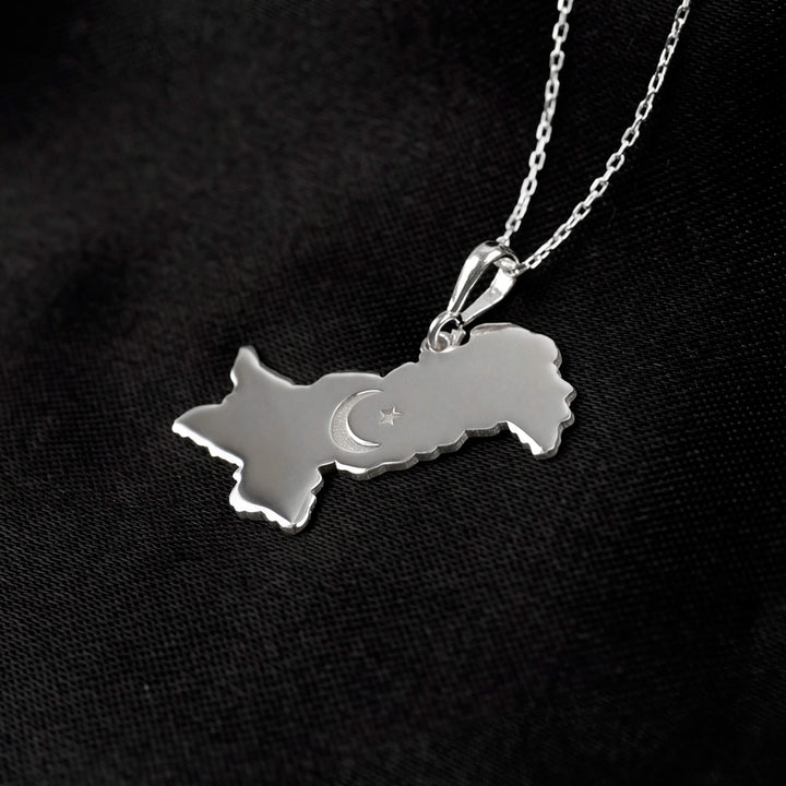 Pakistan map necklace, polished silver