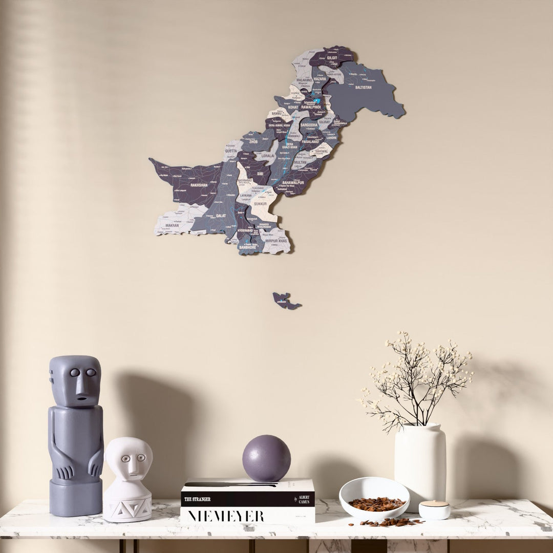 Nimbus Pakistan wooden wall map above a marble console, front view