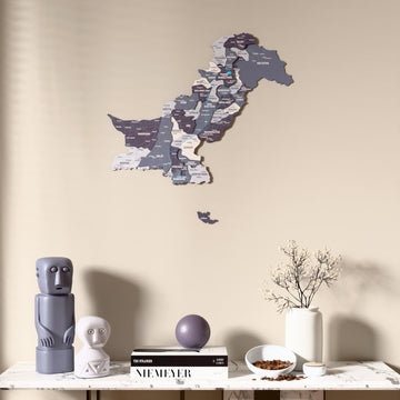 Nimbus Pakistan wooden wall map above a marble console, front view