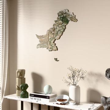 Satellite Pakistan wooden wall map beside a sheer curtain, angled view