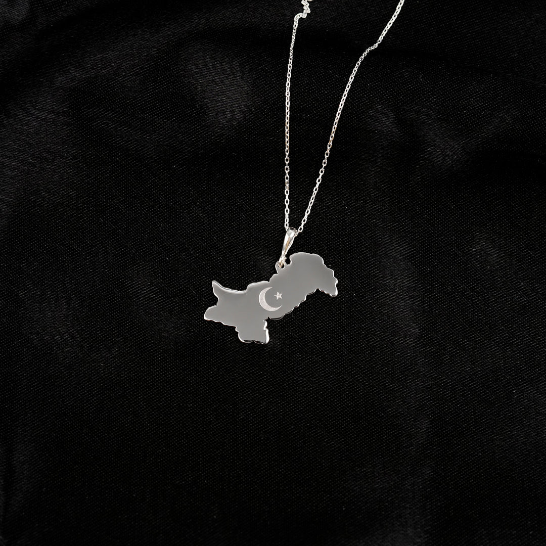 Pakistan map necklace in silver on black satin