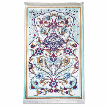 Pastel floral prayer rug with aqua details and white fringe, top view