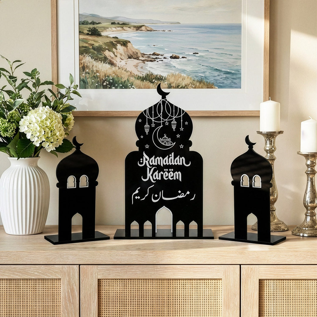 3-piece black acrylic Ramadan decor set featuring a central mosque silhouette with Ramadan Kareem calligraphy and two side minarets.