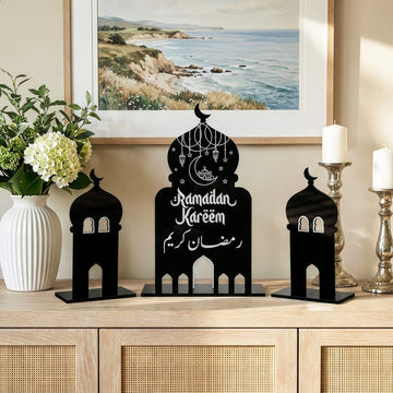 3-piece black acrylic Ramadan decor set featuring a central mosque silhouette with Ramadan Kareem calligraphy and two side minarets.