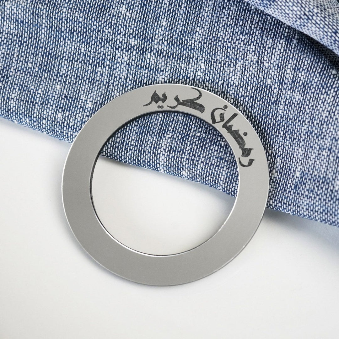Ramadan Kareem circular napkin holder on a set table