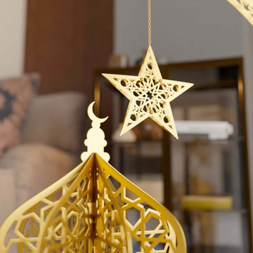 Close-up of the gold lantern dome with a hanging gold star and crescent finial
