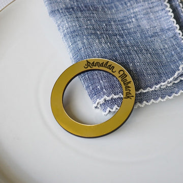 Ramadan Mubarak circular napkin holder on a set table