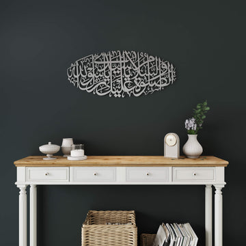 Small view of Matte Silver Salawat metal wall art above a white console table with baskets