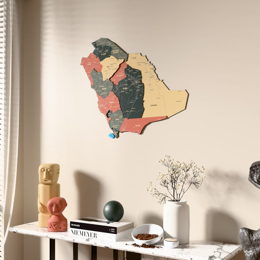 Sage Saudi Arabia wooden wall map beside a sheer curtain, angled view