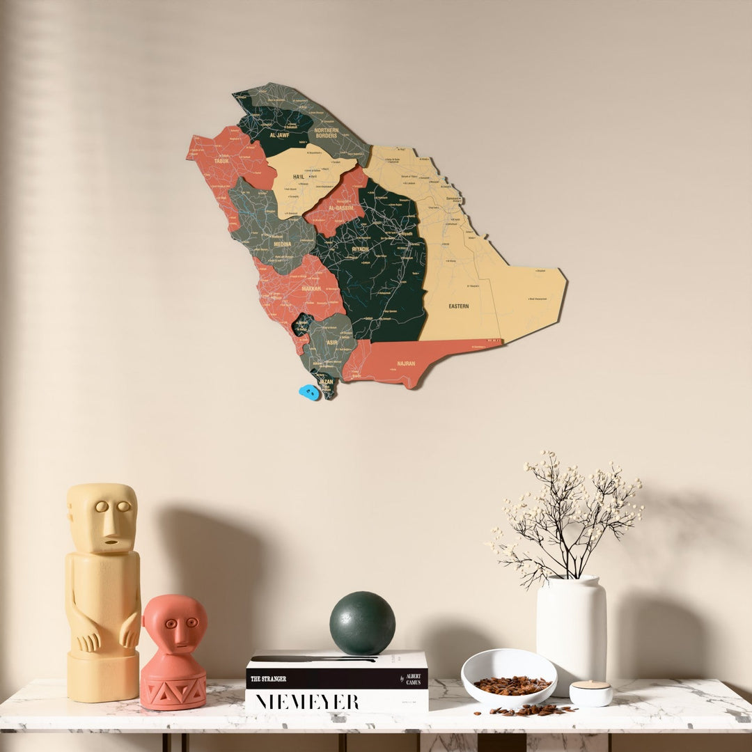 Sage Saudi Arabia wooden wall map above a marble console, front view