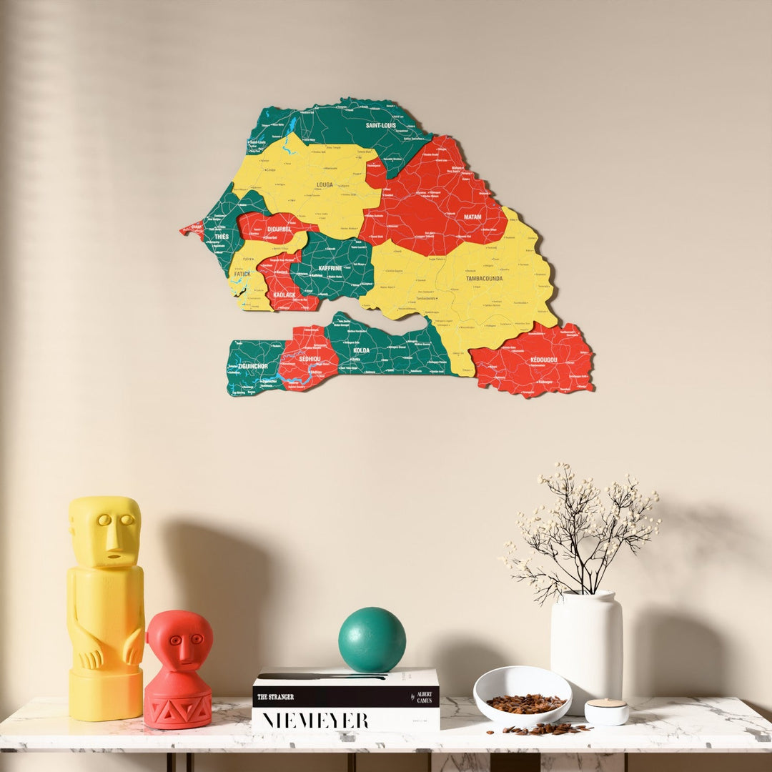 Flag colored Senegal wooden wall map above a marble console, front view