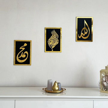 Basmala, Allah and Muhammad wooden wall art set, Gold on Black, above a white sideboard