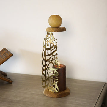 shiny-gold-metal-candleholder-hadha-min-fadli-rabbi-islamic-decor-dining-table-islamicwallartstore