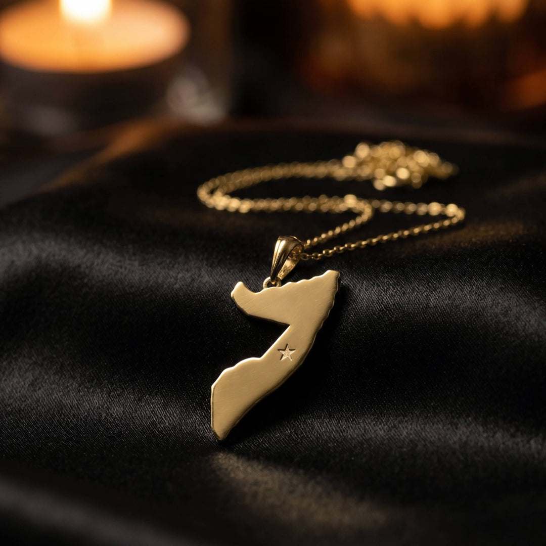 Somalia map necklace, gold finish