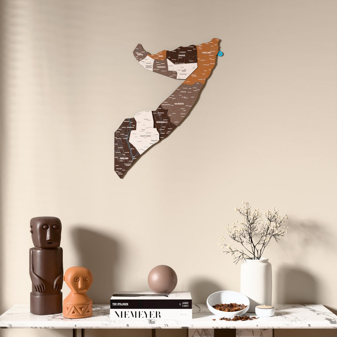 Soil Somalia wooden wall map above a marble console, front view
