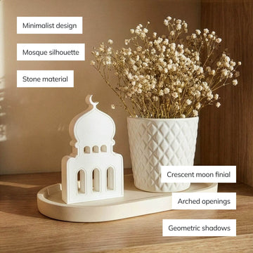 Stone mosque silhouette decor beside a white vase with dried flowers, labeled with its design features