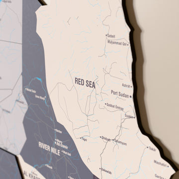 Close-up of the Nimbus Sudan wooden wall map with layered regions and printed names