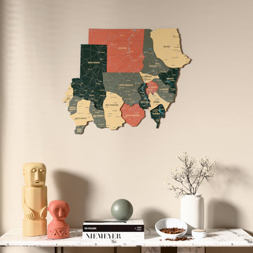 Sage Sudan wooden wall map above a marble console, front view