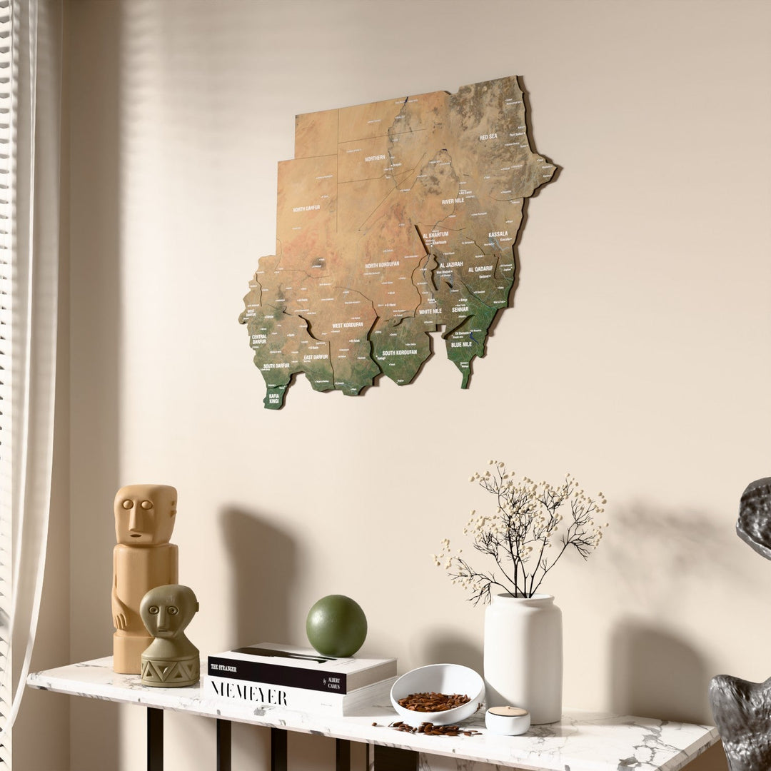 Satellite Sudan wooden wall map beside a sheer curtain, angled view