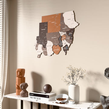 Soil Sudan wooden wall map beside a sheer curtain, angled view