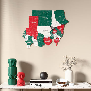 Flag colored Sudan wooden wall map above a marble console, front view
